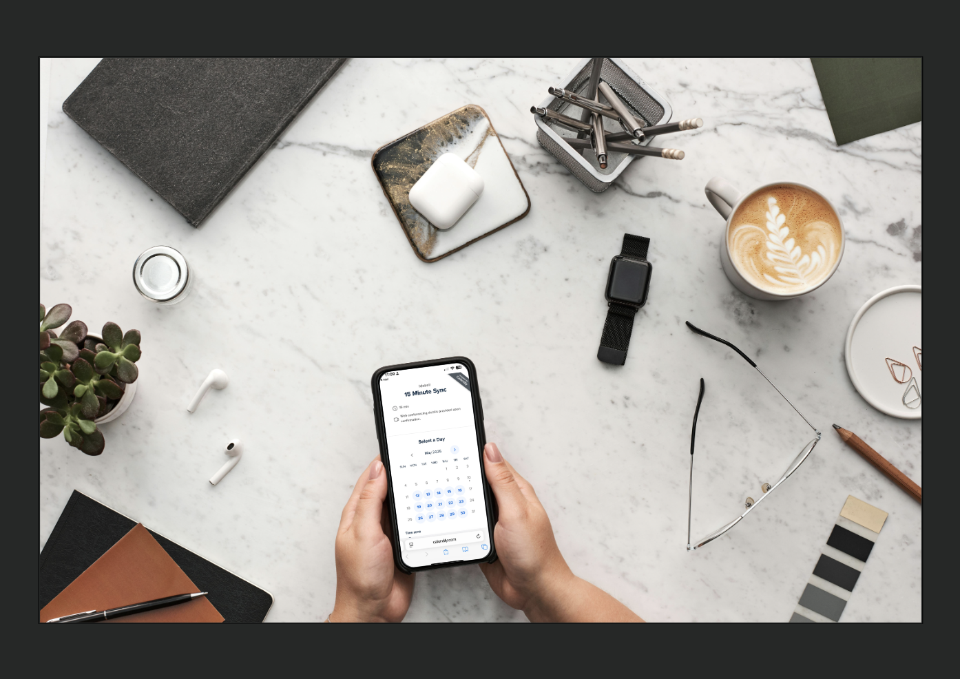 person having coffee and running a successful business appointment off his phone.